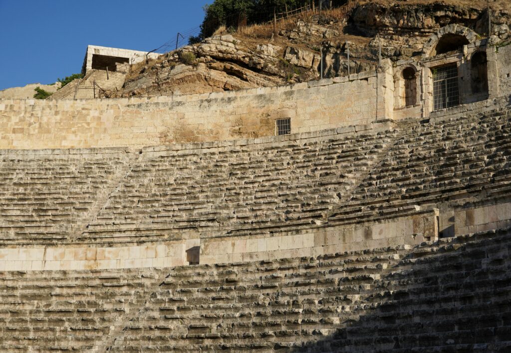 View of the historic Roman amphitheater in Amman, showcasing ancient architecture.
